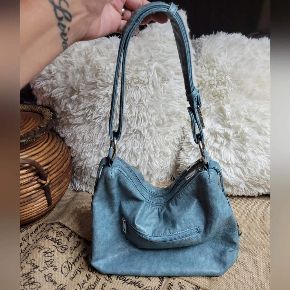 Greyish blue faux leather shoulder bag with silver tone hardware